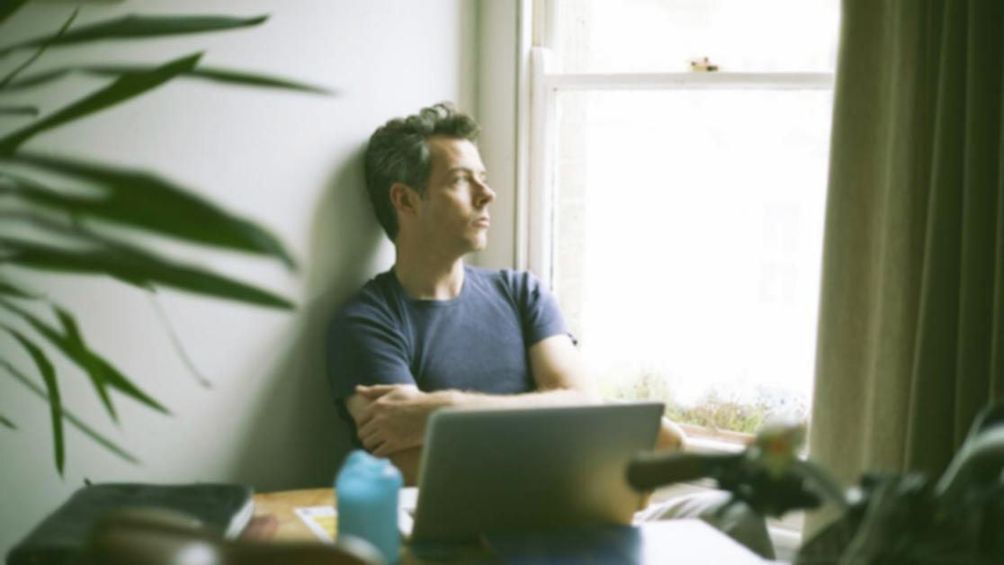 Modern financial technology workspace with multiple screens displaying budget analytics and data visualization
